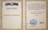 Ramil Usubov "Report" Agentliyinin fotomüxbirini "Fəxri fərman"la təltif edib - FOTO